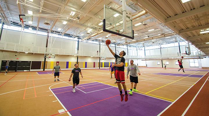 a pickup game of basketball on the court